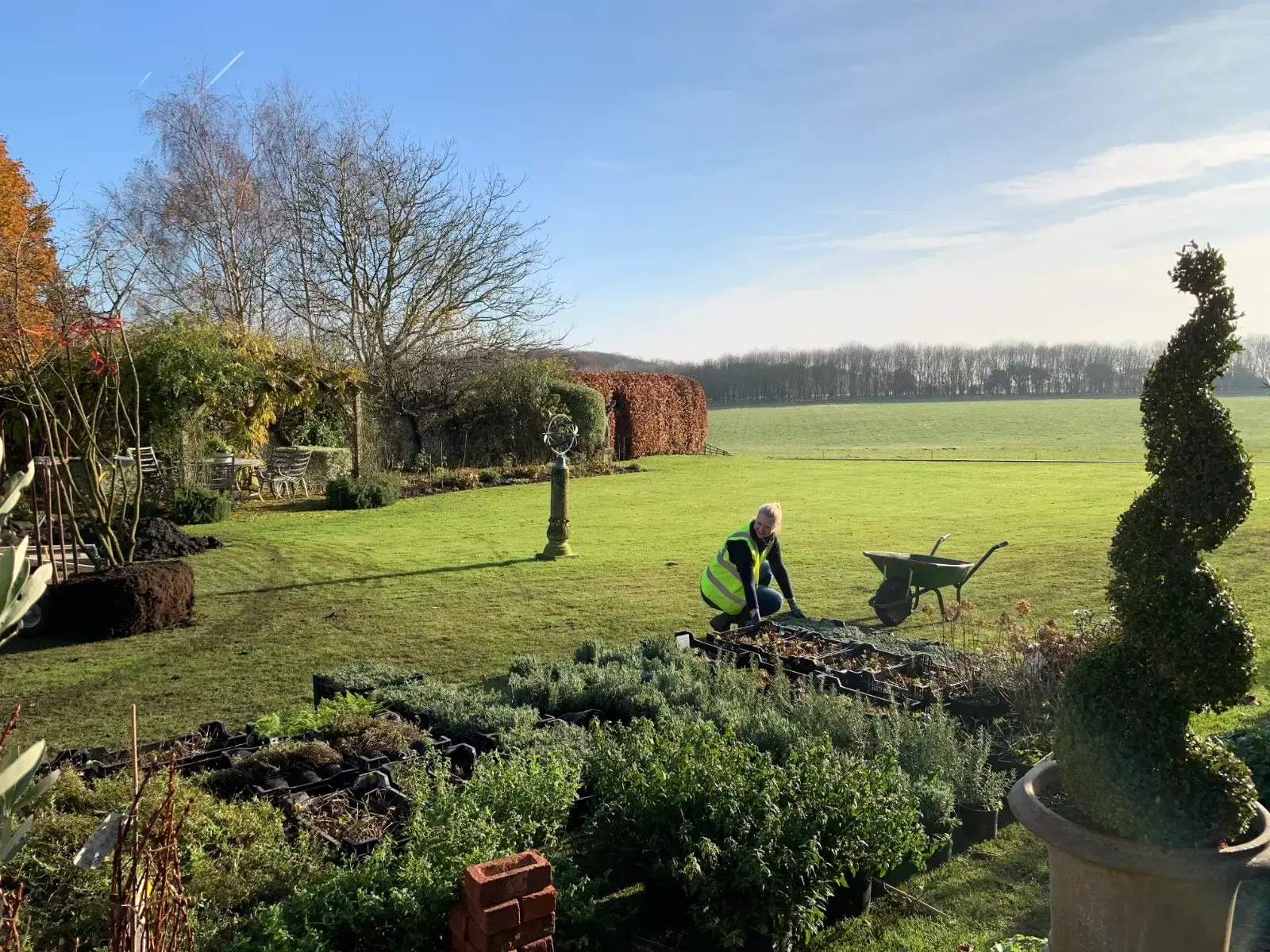Professional landscaper working in a UK garden